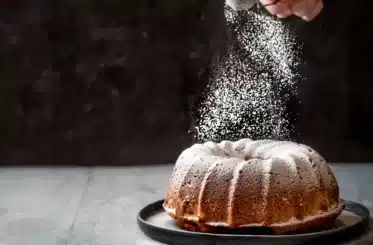 powdered sugar sifted over a bundt cake