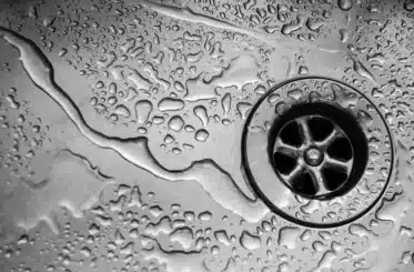 drain with water droplets all around it