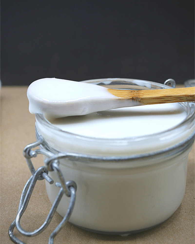glass jar with sweetened condensed coconut milk