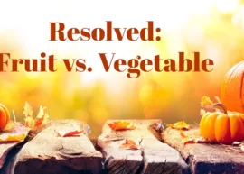 Pumpkins on either side of the words "Resolved: Fruit vs. Vegetable"