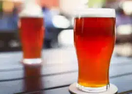 Two glasses of beer on a table