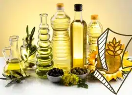 A combination of different cooking oils and a pointing-down arrow with the dietary fiber logo inside.