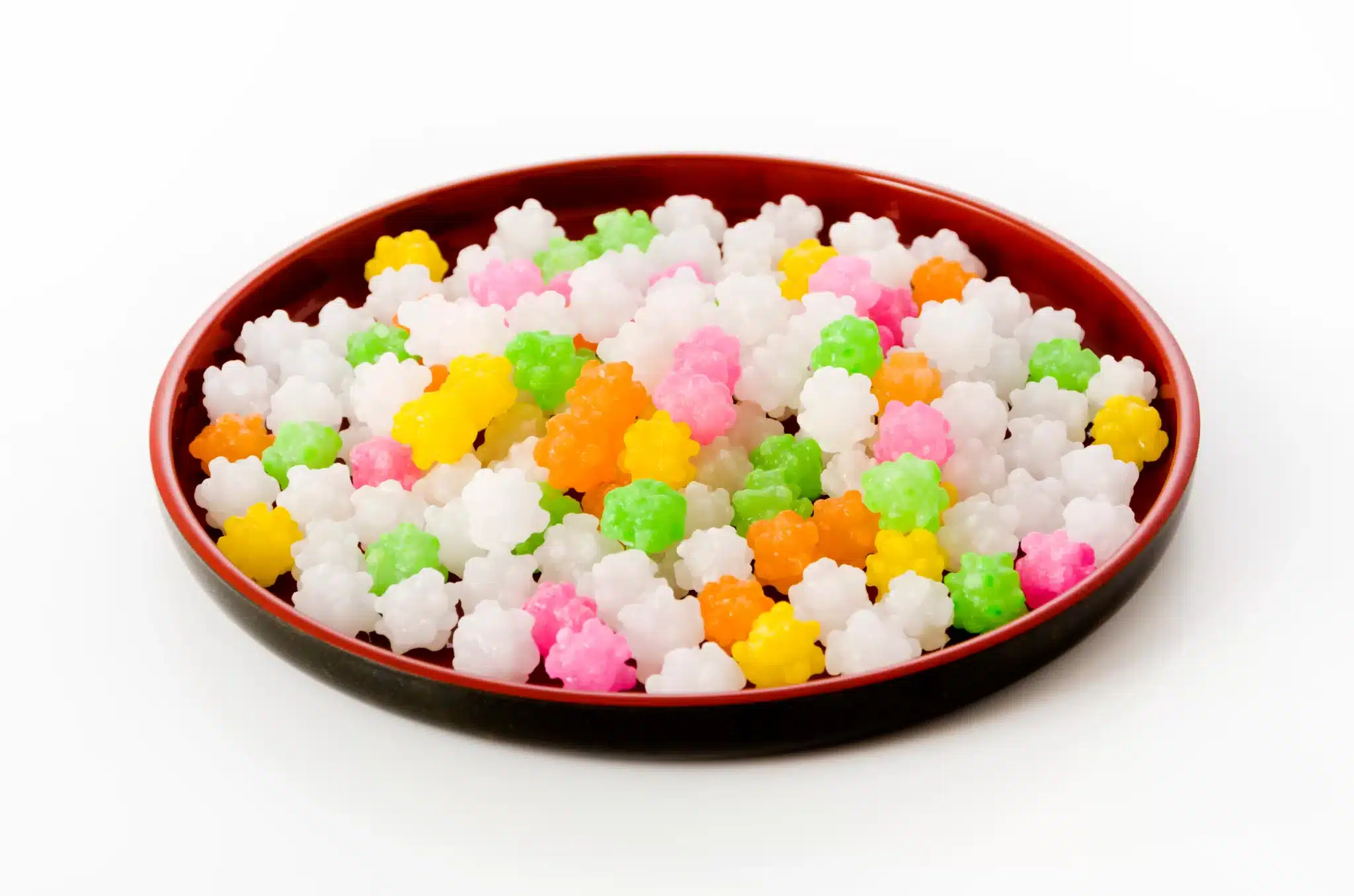 A plate full of colorful konpeitō candies.