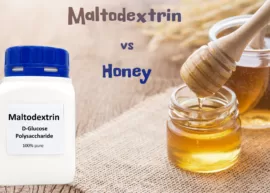 A wooden table showcasing a jar of maltodextrin and two containers of honey, one with a spoon tucked inside and the other with a stirrer.