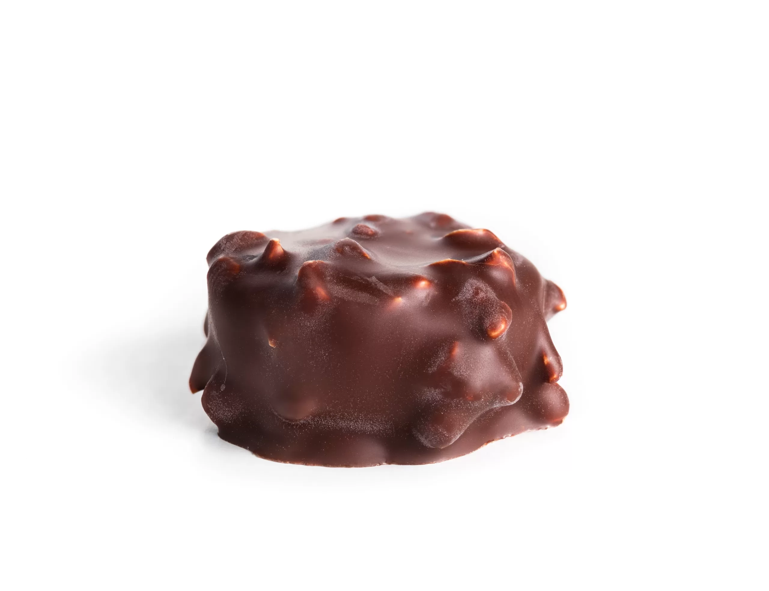 A single praline piece set on a white background. 