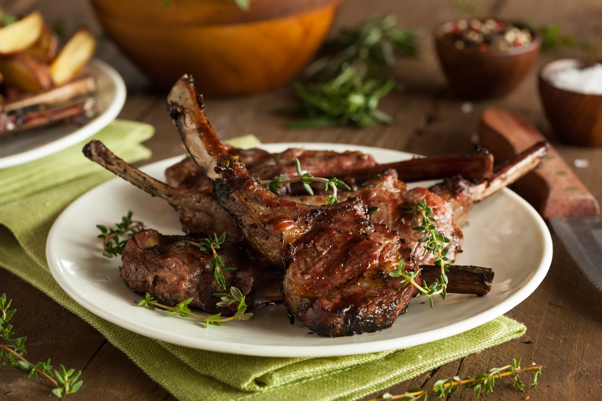 A portion of organic grilled lamb with garlic and lime.