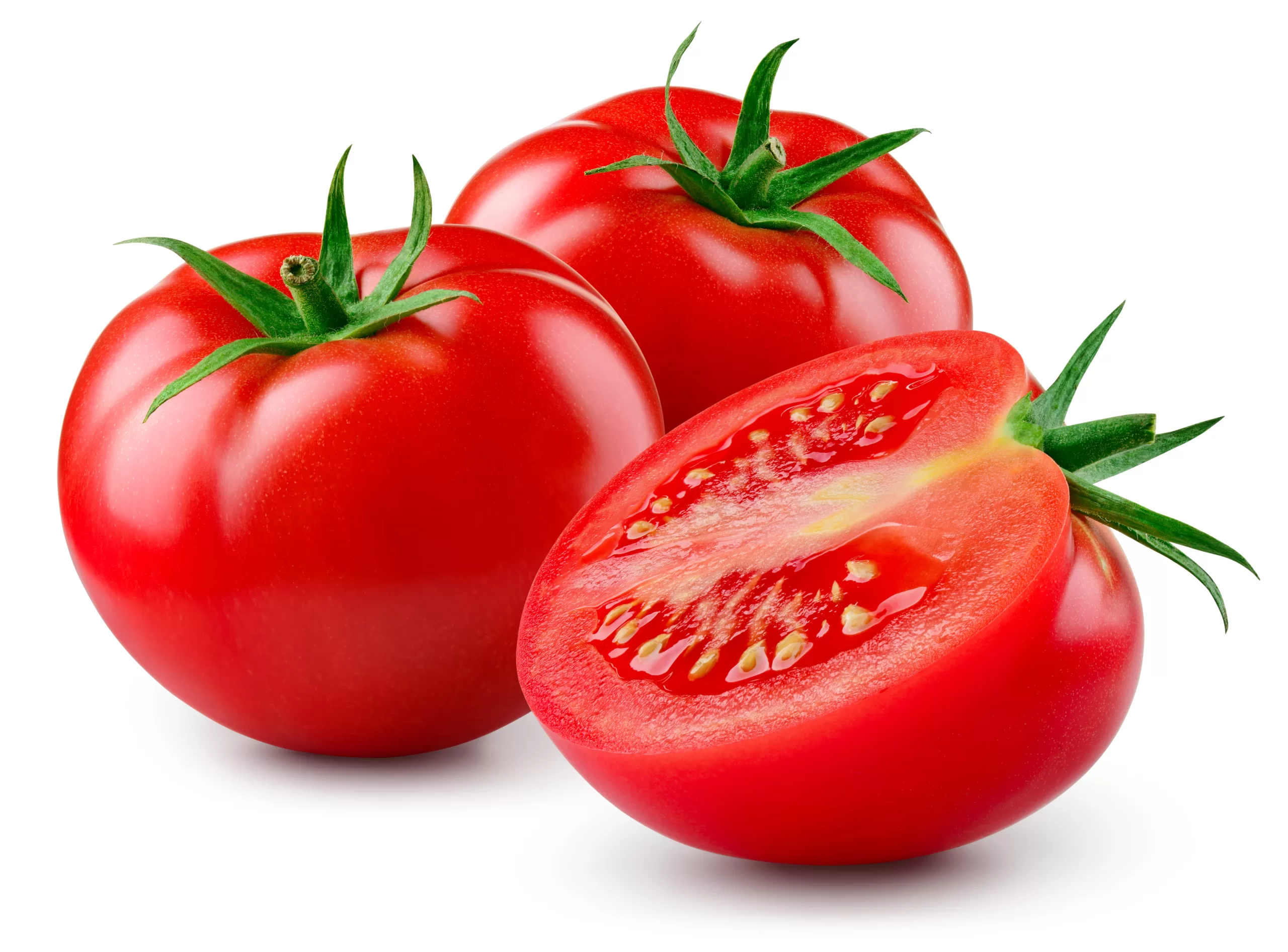 A few fresh tomatoes on a white background. 