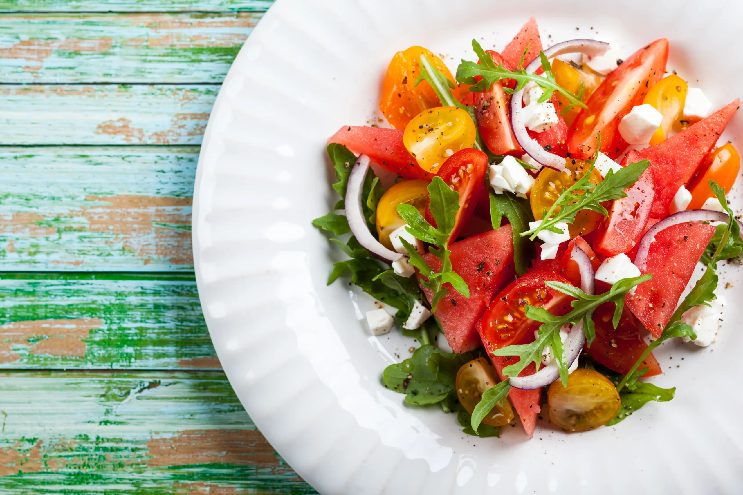 Overhead view of a portion of watermelon salad.