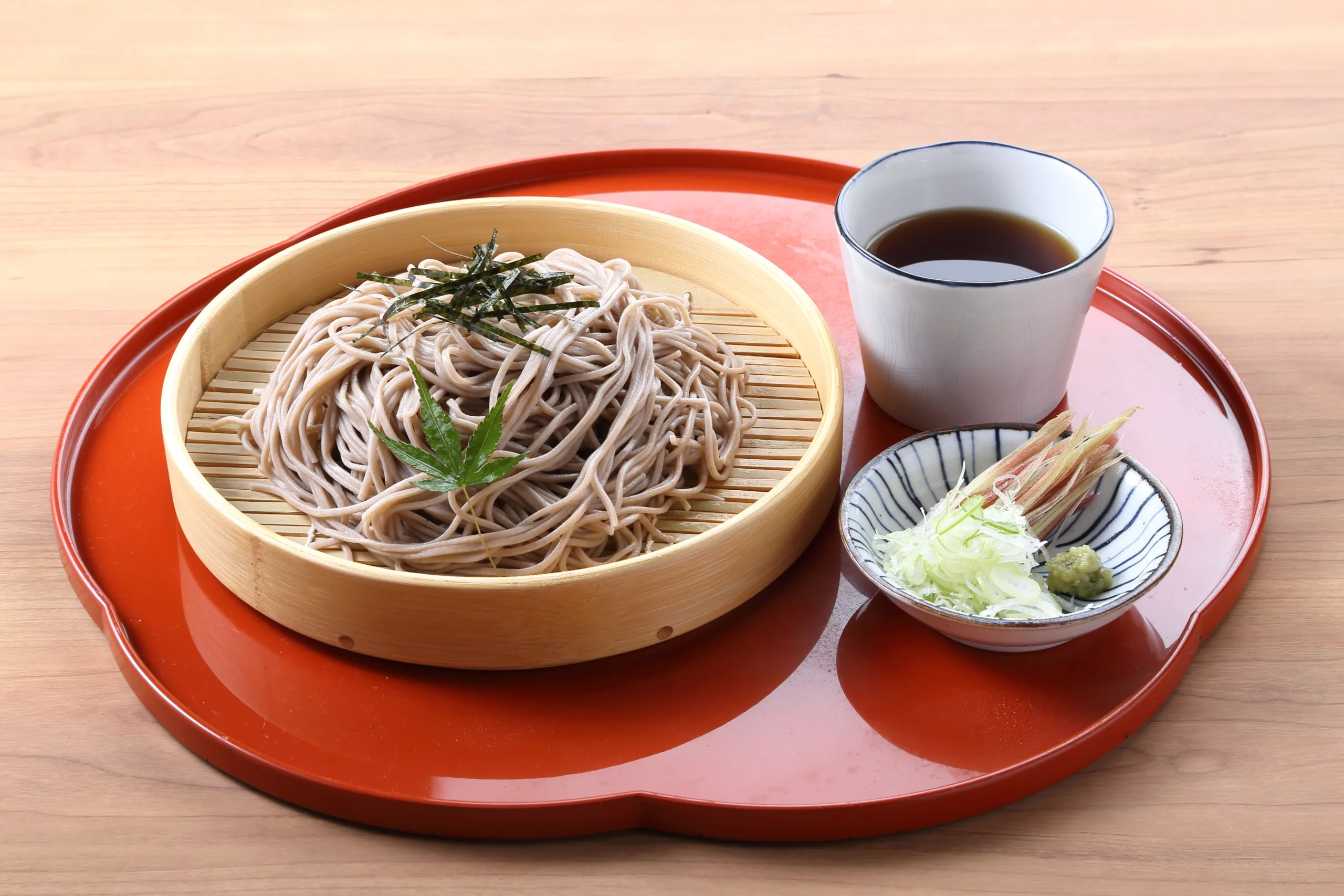 A traditional Japanese meal including zaru soba noodles.