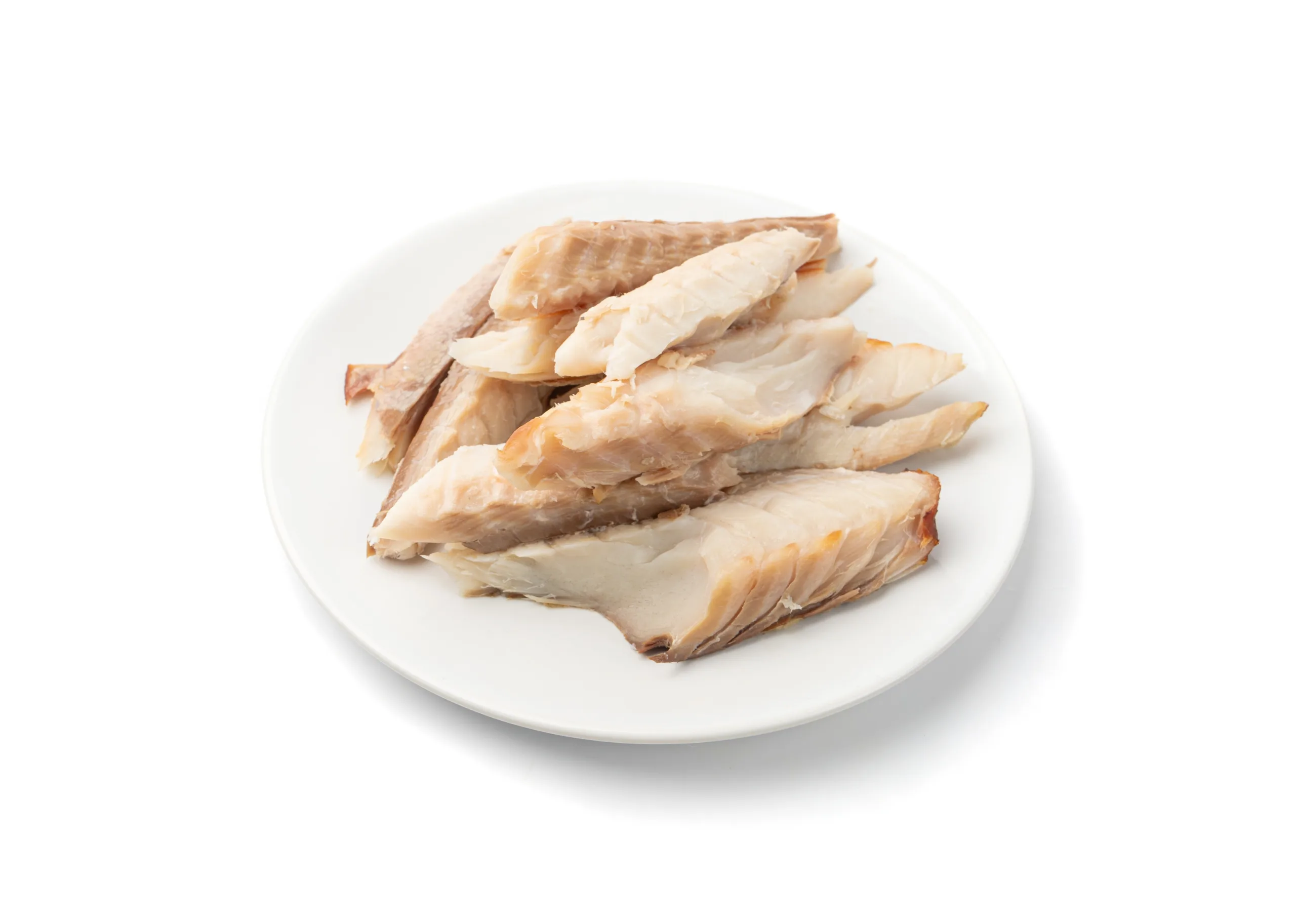 A white backdrop featuring a plate of steamed warehou fish.