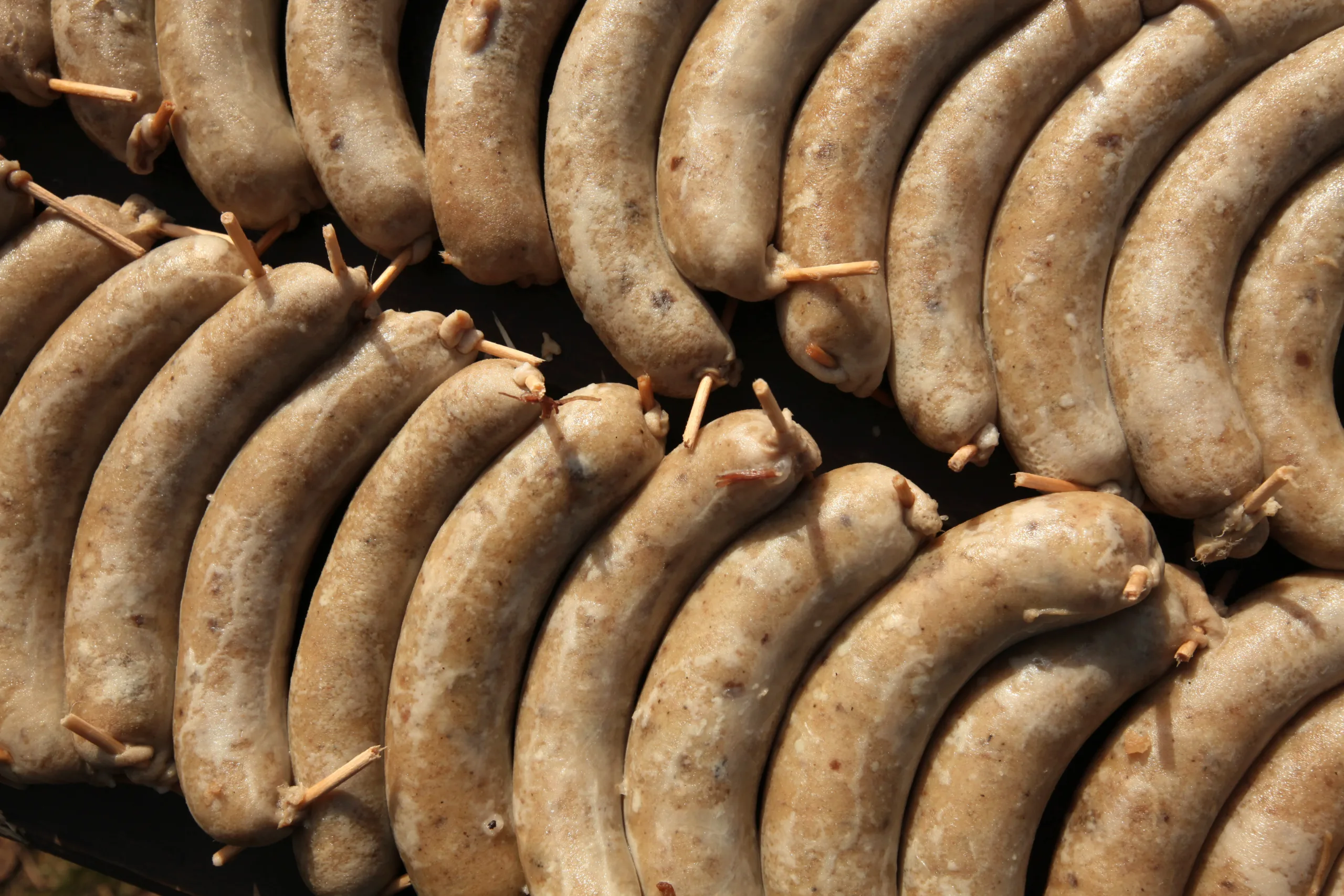 Jitrnice sausages displayed during the Zabijačka celebration.