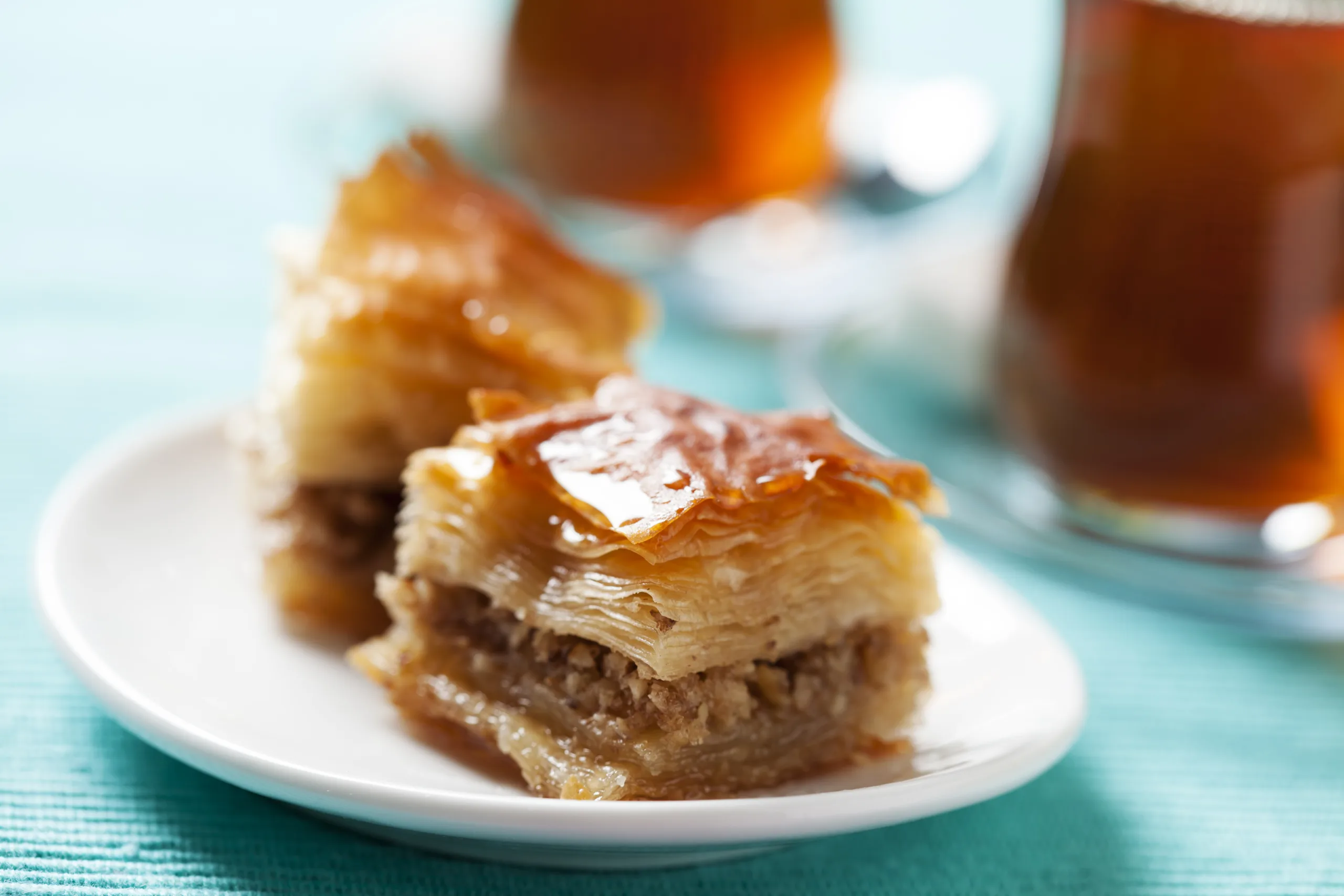 A close-up of a couple of pieces of walnut baklava.