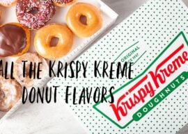 Box of Krispy Kreme donuts open with another box next to it with the Krispy Kreme logo. Text in front reads "All the Krispy Kreme Donut Flavors"