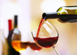 wine bottle pouring into a glass