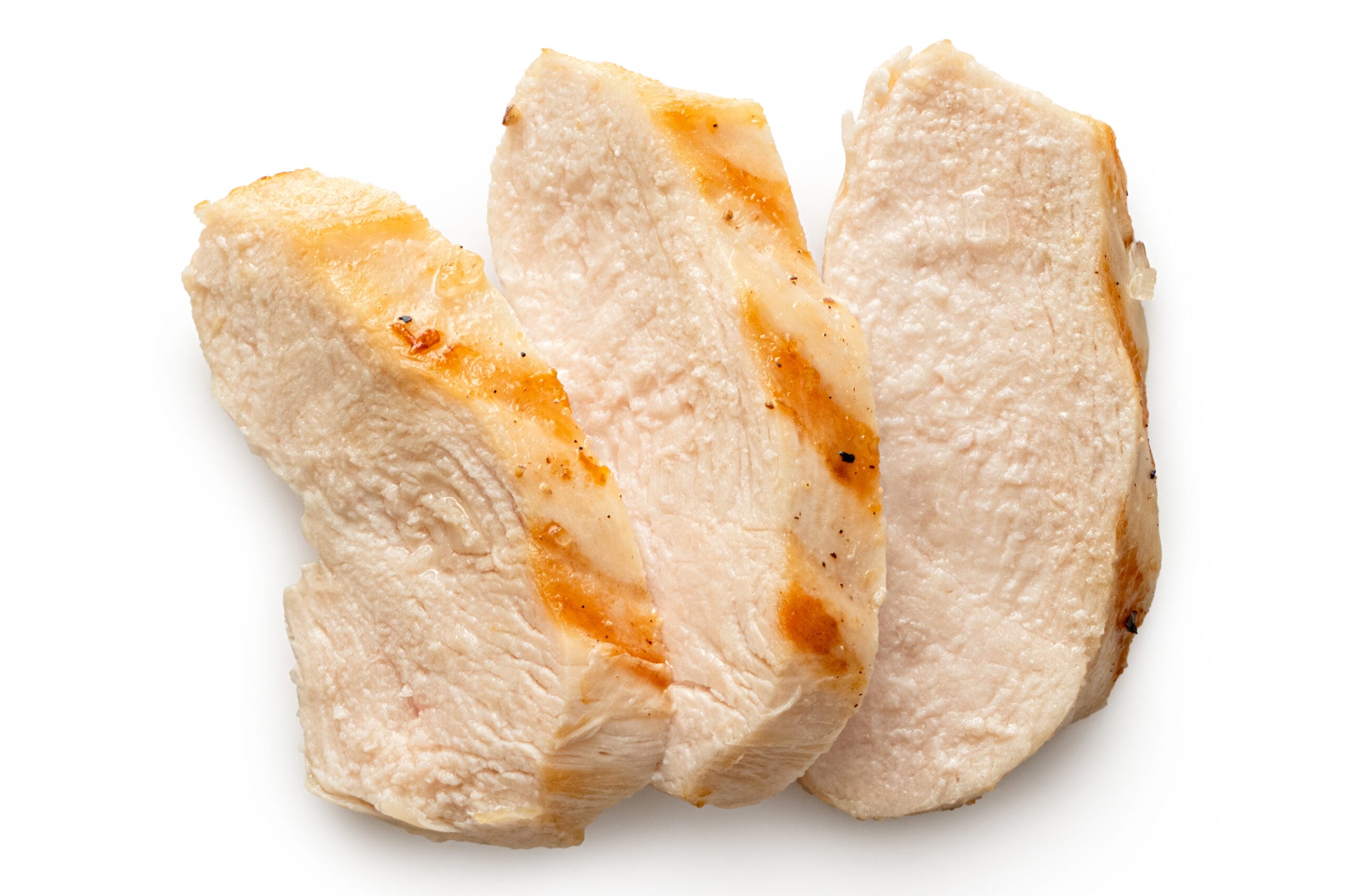 Three slices of grilled chicken breast. 