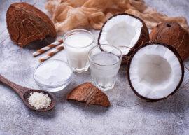A set of coconut food products including milk, water, oil and shavings.
