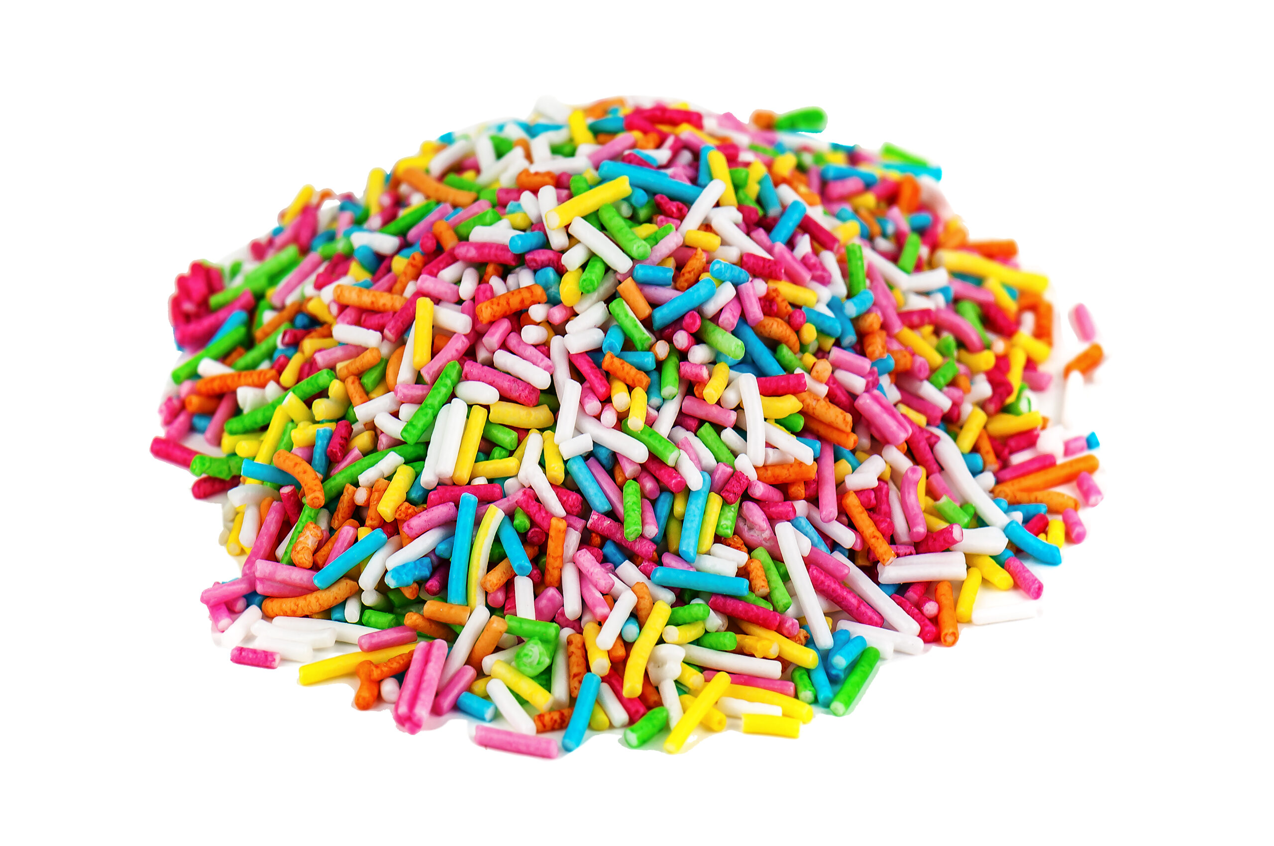A pile of rainbow sprinkles on a white background. 