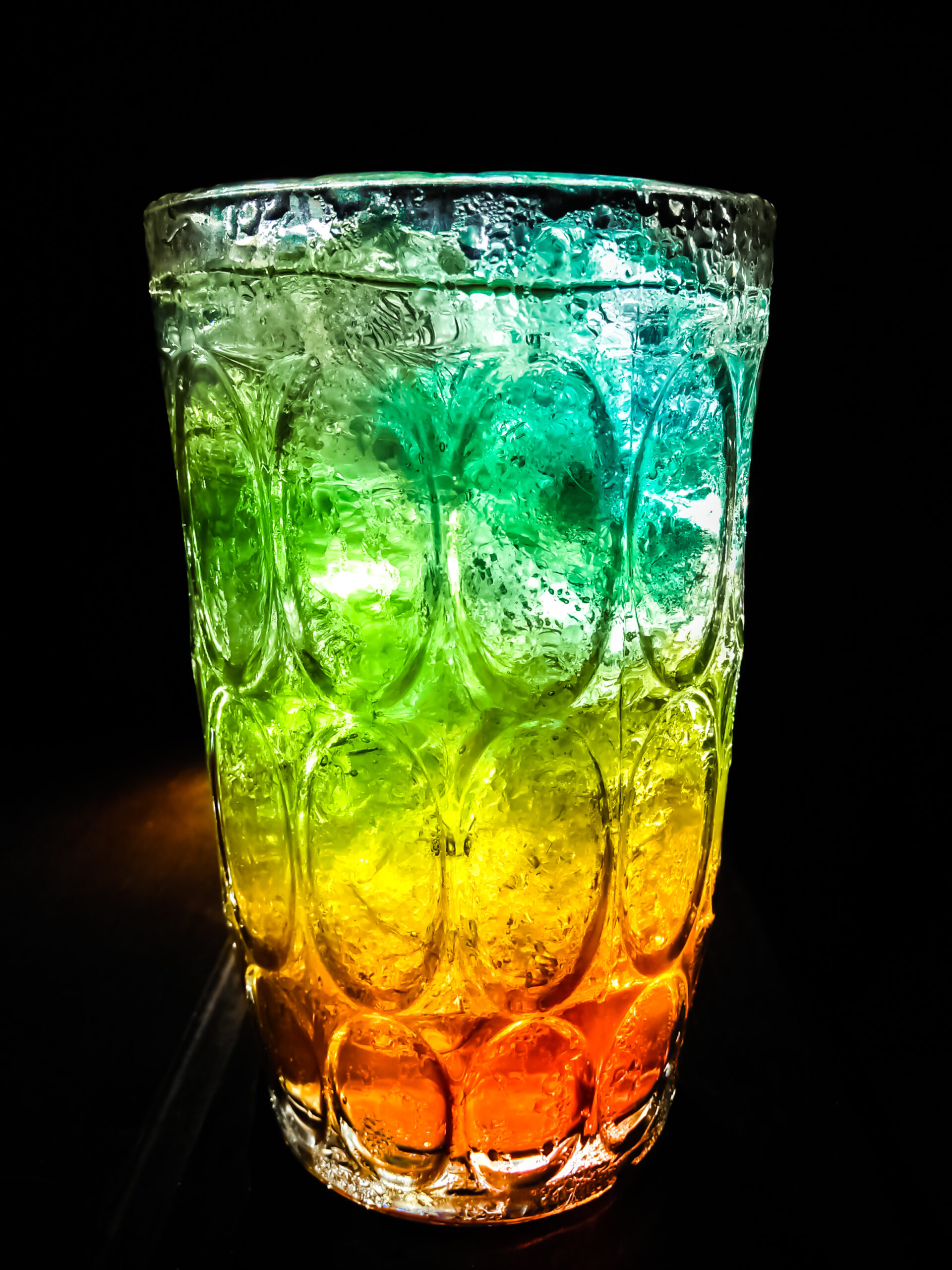 Rainbow,Tropical,Drink,Mojito A black backdrop showcasing a rainbow mojito.