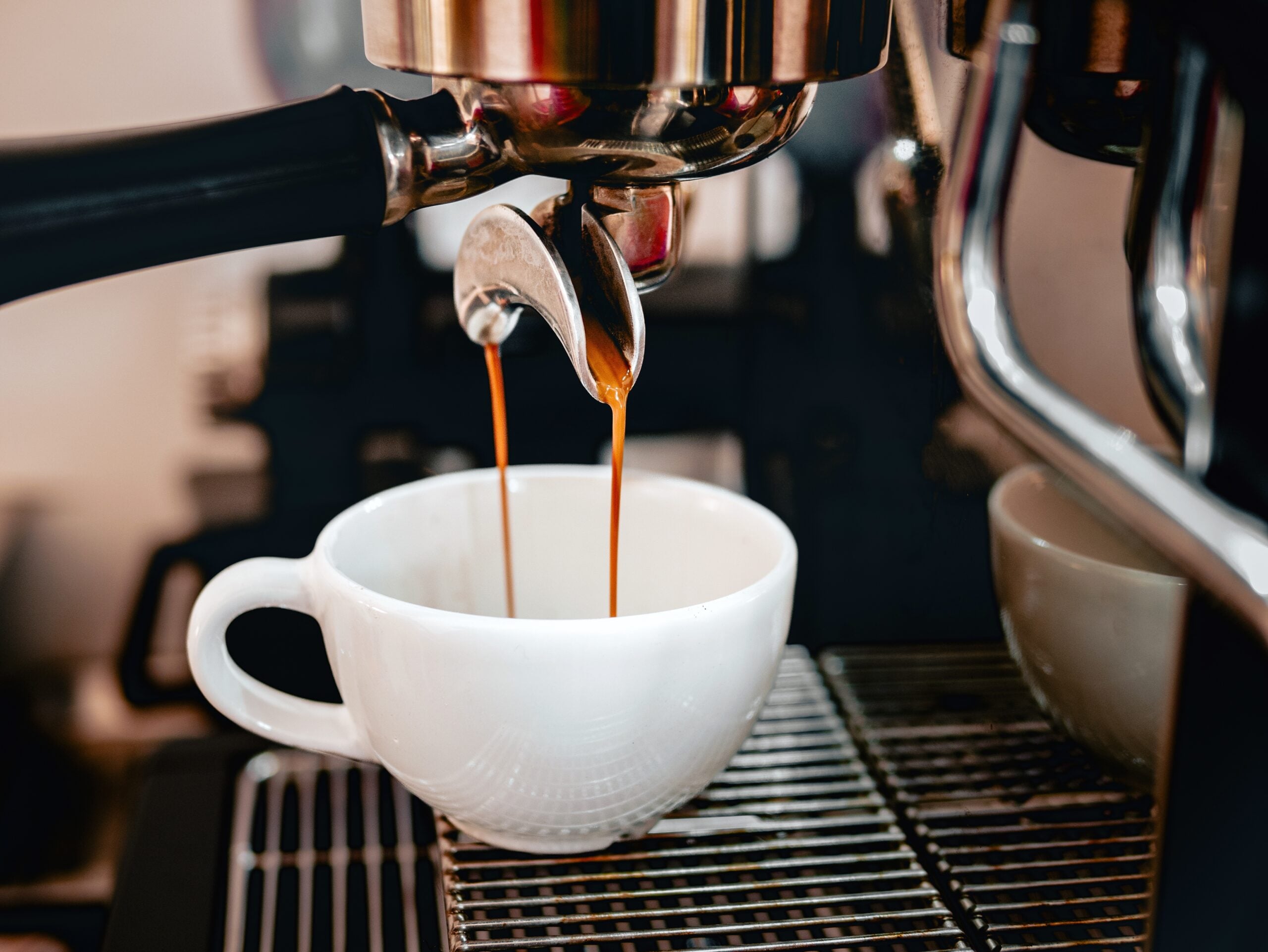 A coffee machine preparing an espresso.