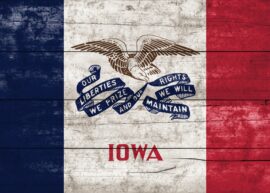 Iowa flag on distressed wood