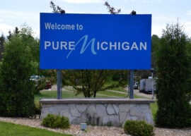 Road sign reads "welcome to Pure Michigan"
