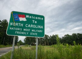 Road sign that reads "Welcome to North Carolina Nation's Most Military Friendly State"