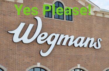 Wegmans logo with "Yes Please" written on top in green text