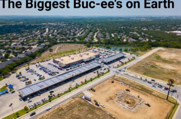 Aerial shot of a Buc-ee's. Text is "The Biggest Buc-ee's on Earth"