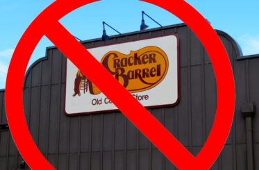 Cracker Barrel logo with a big red "cancel" sign over it