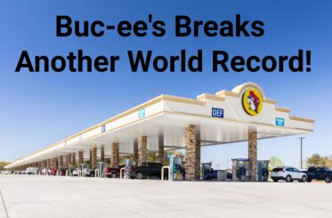 Picture of a Buc-ee's gas station with text above: "Buc-ee's Breaks Another World Record!"