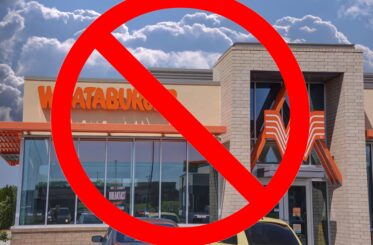 Whataburger restaurant with a big red cancel sign over it