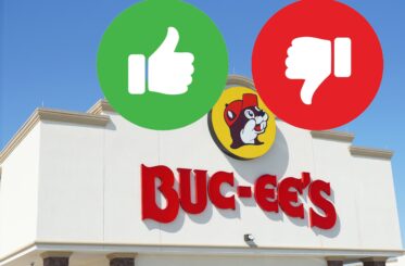Buc-ee's logo with a green thumbs-up and a red thumbs-down on either side