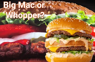 "Big Mac or Whopper?" with a Big Mac on top of a huge Whopper.