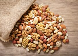 Mixed nuts falling out of a sack