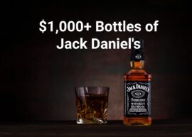 Bottle of Jack Daniel's whiskey with a filled glass next to it. And superimposed above them, in white text, reads: "$1,000+ Bottles of Jack Daniel's"