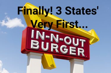 In-N-Out Burger sign with black text above: "Finally! 3 States' Very First..." And then In-N-Out Burger is right below that.