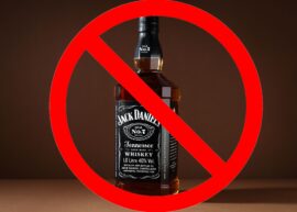 Jack Daniel's bottle with a big red cancel sign over it