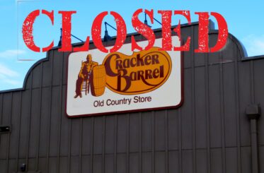 Cracker Barrel logo on a brown building with a big red "CLOSED" sign superimposed in front