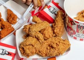 Several KFC chicken dishes, as seen from above