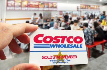 Hand holding Costco Gold Member card