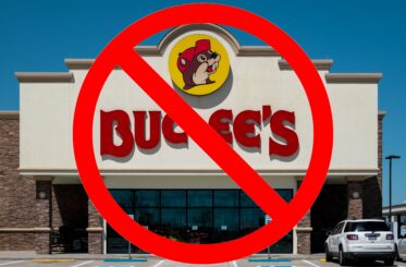 Buc-ee's sign with a big "cancel" symbol over it