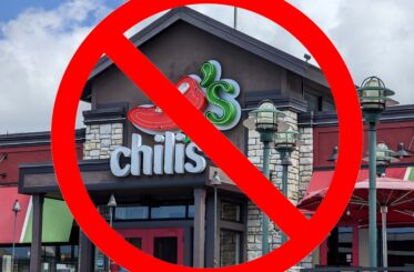 Chili's restaurant with a big red cancel sign over it