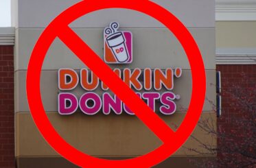 Dunkin' Donuts sign with a big red cancel sign over it