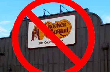 Cracker Barrel sign with a big red cancel symbol over it
