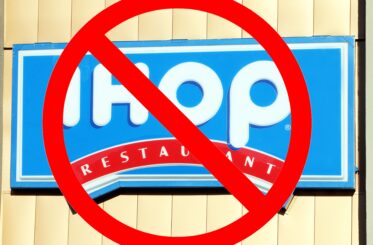 IHOP restaurant sign with a big red cancel symbol over it