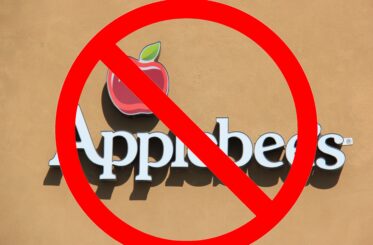 Applebee's sign with a big red cancel symbol over it