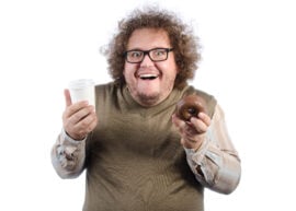 Fan loving donuts and coffee
