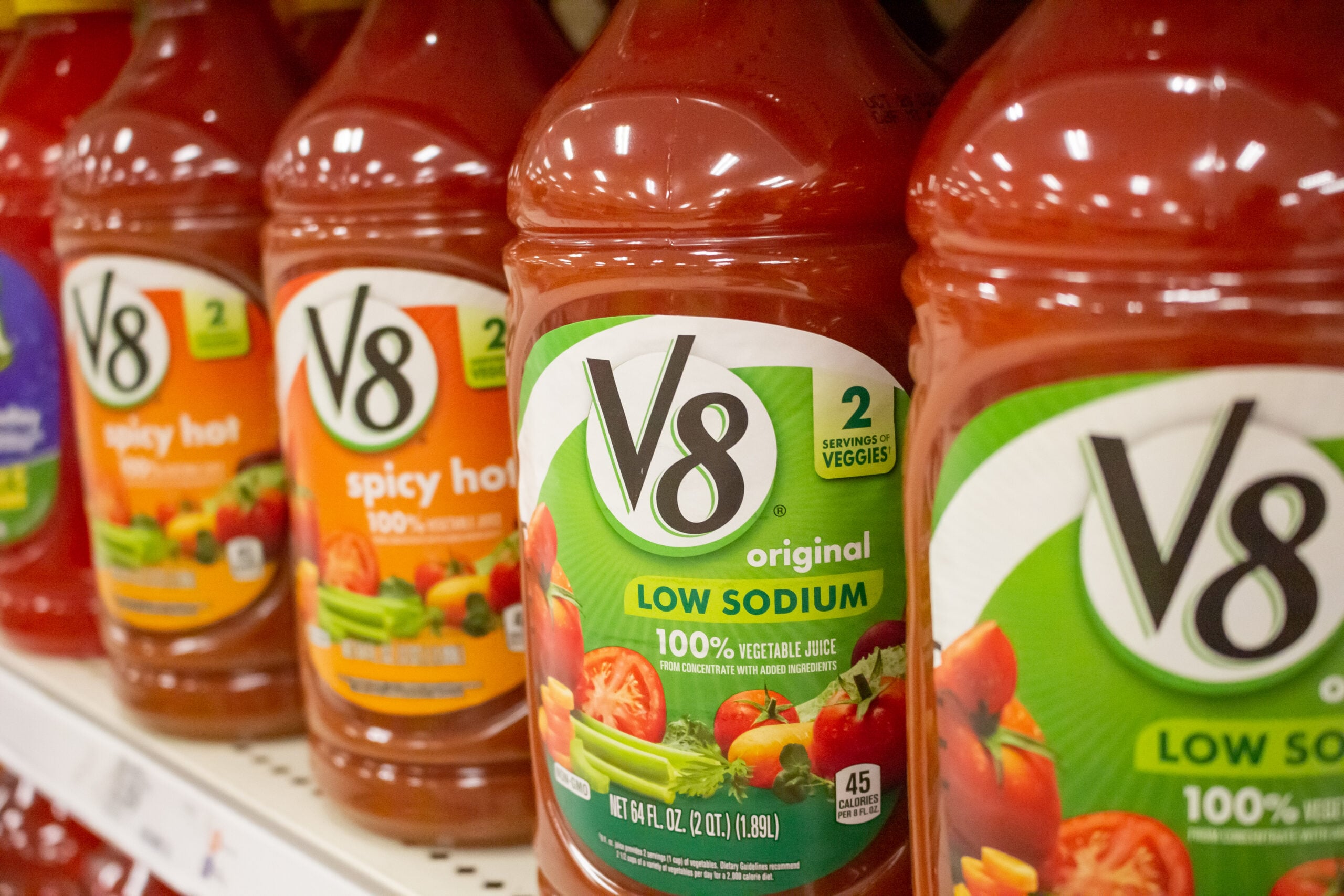 A view of several big bottles of V8 juice on display at a local grocery store.