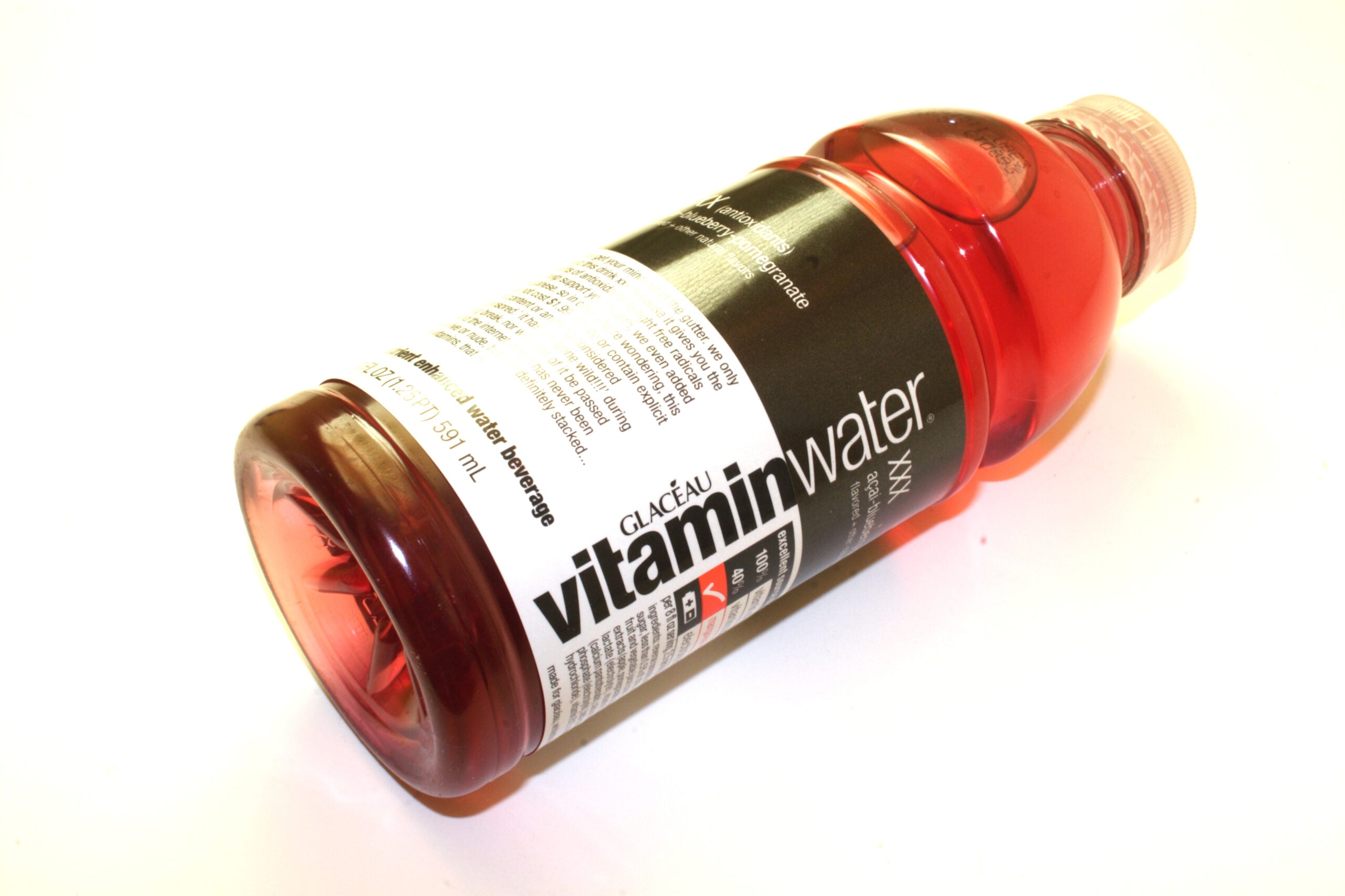 Bottle of Glaceau vitamin water on a white background.