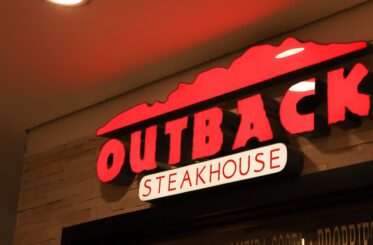Lit up Outback Steakhouse sign